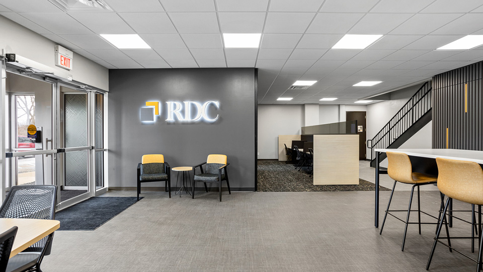 modern commercial office kitchen and breakroom remodel with custom cabinetry and seating by Gannon and Company