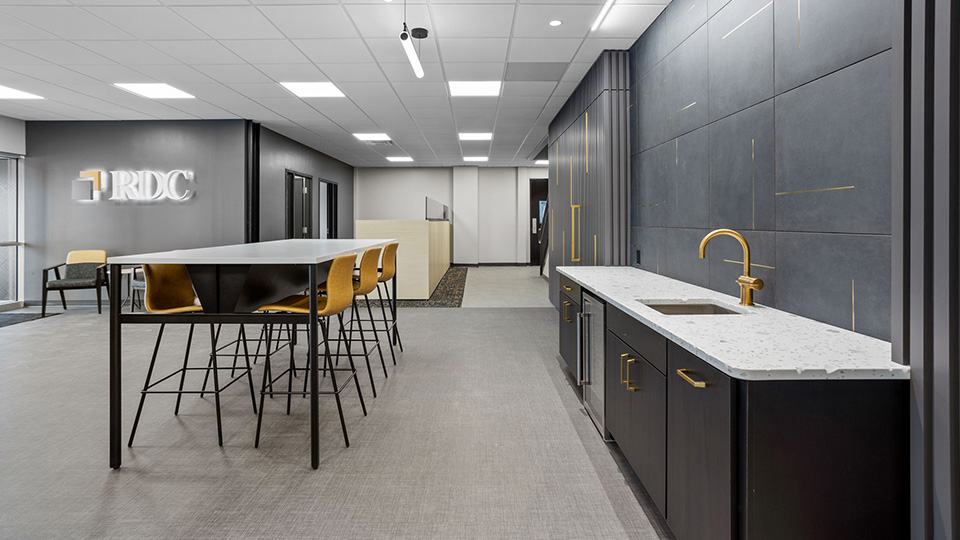 modern commercial office kitchen and breakroom remodel with custom cabinetry and seating by Gannon and Company